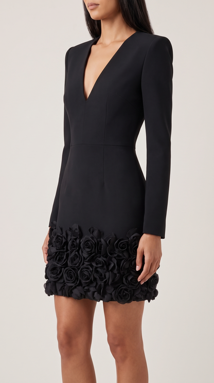 Black V-neck mini dress with 3D rose embellishment, side view