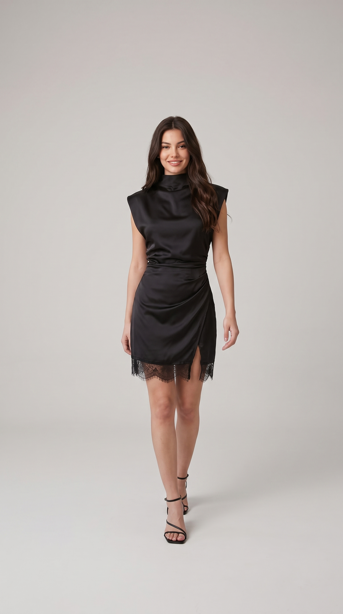 Black satin mock neck mini dress with lace hem, walking pose