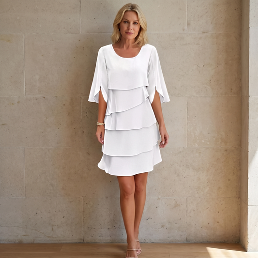 Ruffled layered flutter sleeve dress, full length editorial