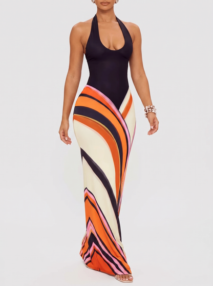 Halter neck maxi dress with abstract print, walking pose