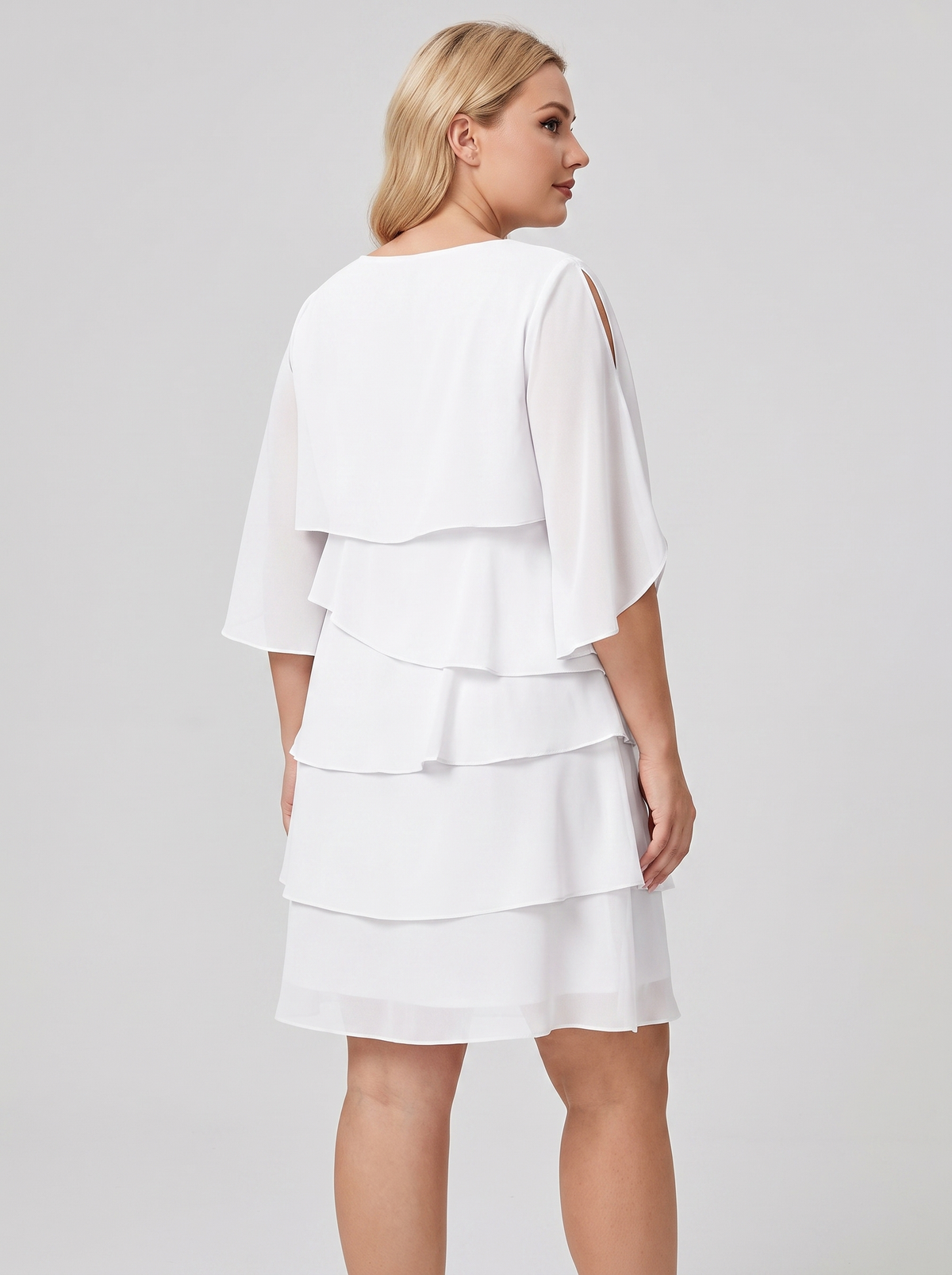 Ruffled layered flutter sleeve dress, side view