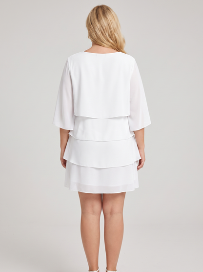 Ruffled layered flutter sleeve dress, back view