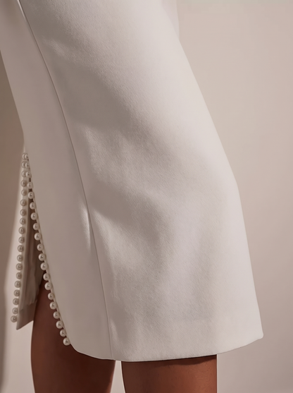 Slim-fit elegant midi dress with beaded slit sleeve, skirt and hem detail