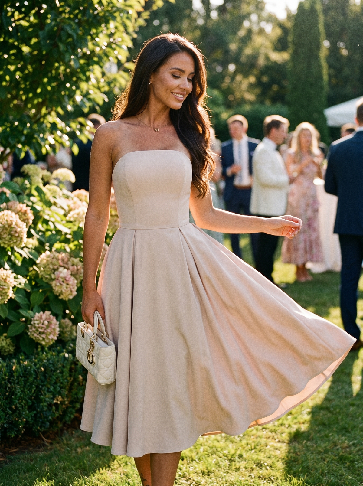 Strapless ruched A line midi dress at a summer garden party