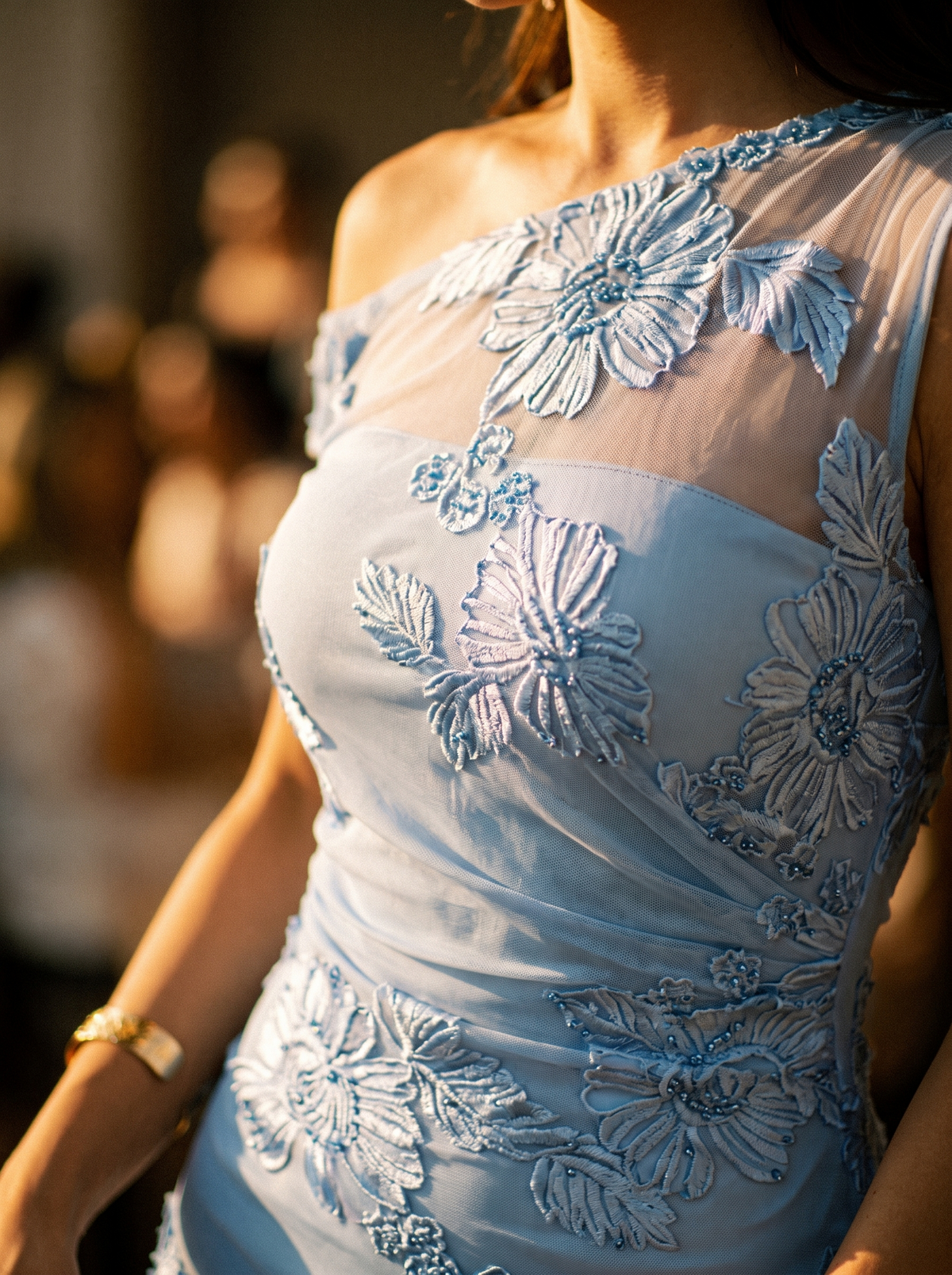 Embroidered detail across the single shoulder of the maxi gown